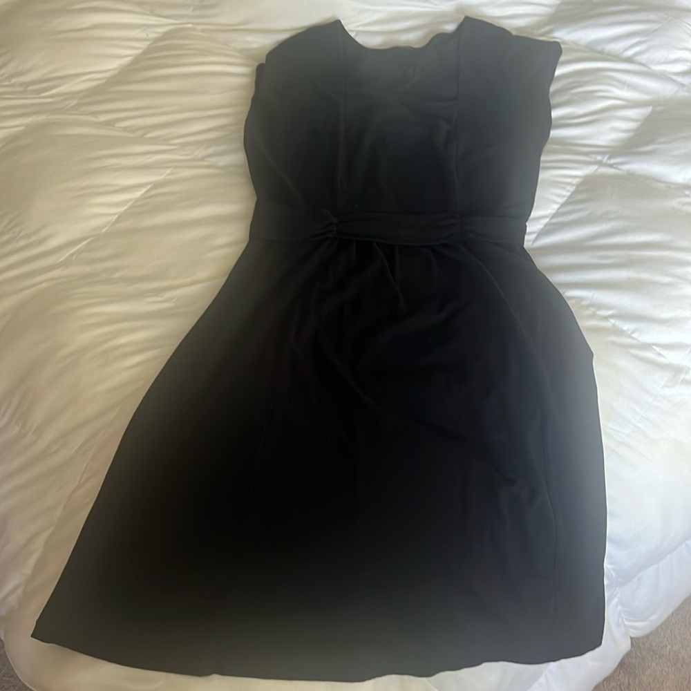 Lands’End black small sleeve dress. With belt detail. Soft forgiving material.